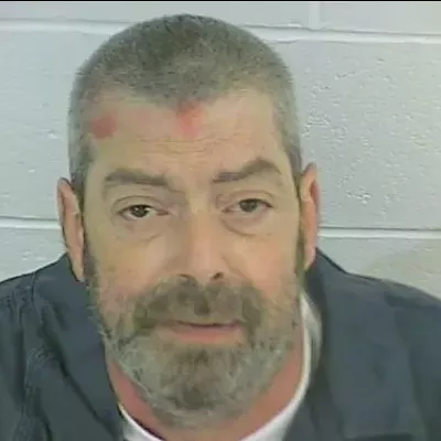 Image: Suspect cuts own throat after arrest