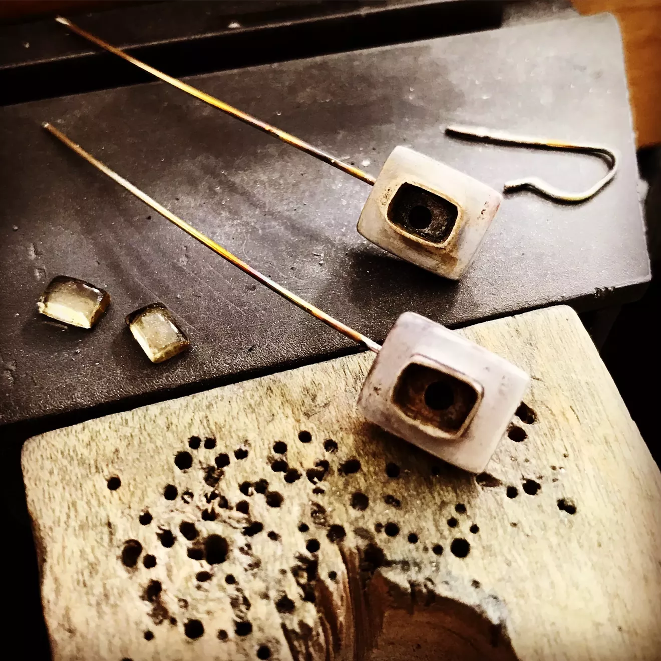 Earring repair in progress.