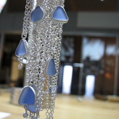 Seaglass set in handmade sterling bezels.