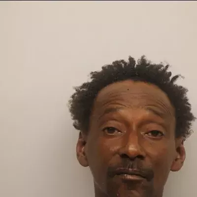 Image: Man arrested for phoning in death threats to police