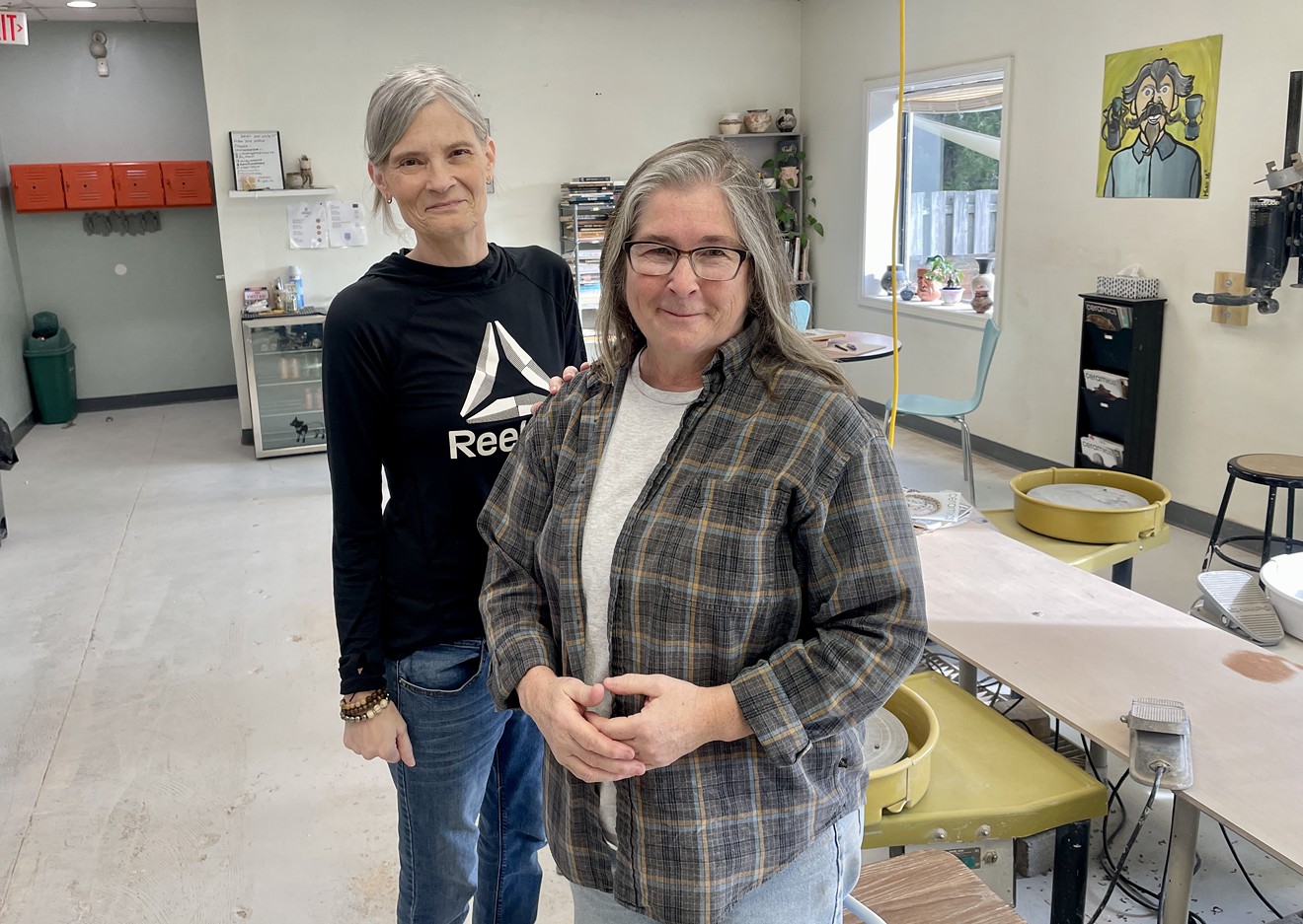 Clair Buckner (front) and Wendy Melton in the open studio of Clayer & Co.