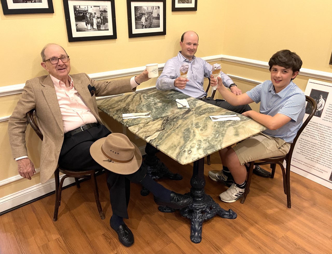 Charles H. Morris, left, enjoys the new Connecting Savannah Legacies ice cream flavor with Charles H. Morris Jr., son, and Charles Morris, III, grandson.