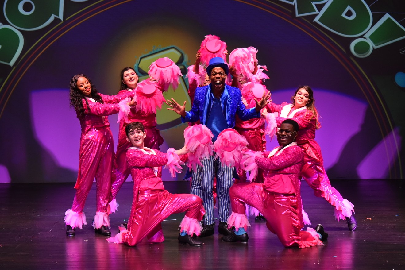 Rayshawn Roberts (center) as Squidward, and the cast of 'SpongeBob the Musical.'