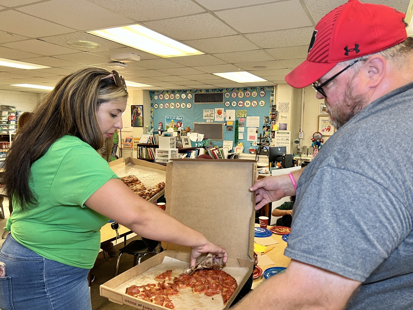 G100, Step One Auto and Donatos Surprise Windsor Forest Elementary Teacher Cynthia Davis with Pizza Party