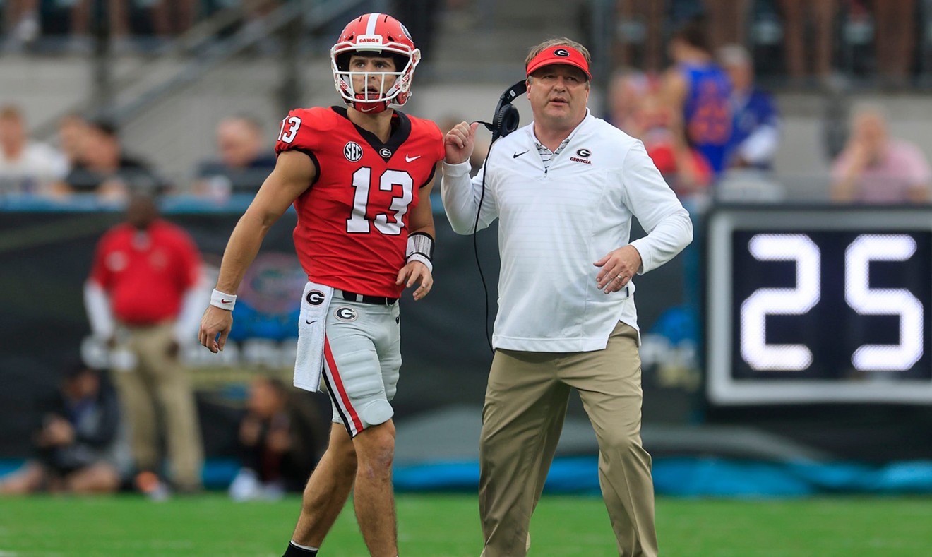 Georgia Bulldogs quarterback Stetson Bennett (13) and head coach Kirby Smart looks on after an interception during the second quarter of the annual Georgia-Floriday game Saturday, Oct. 29, 2022 at TIAA Bank Field in Jacksonville. The Georgia Bulldogs outlasted the Florida Gators 42-20. | Photo by Corey Perrine/USATSI