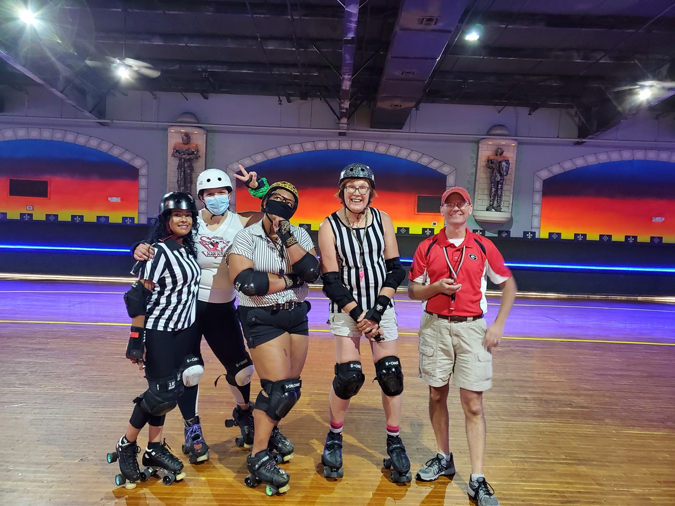 Rollerderby referees and coaches gather in the rink as they prepare for the upcoming season. Open enrollment for the Jr. Derbytaunts runs through the end of August.