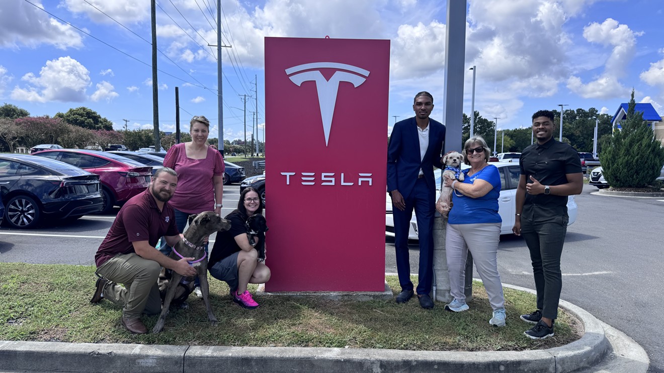 Tesla Hosts Renegade Paws Dog Adoption Event