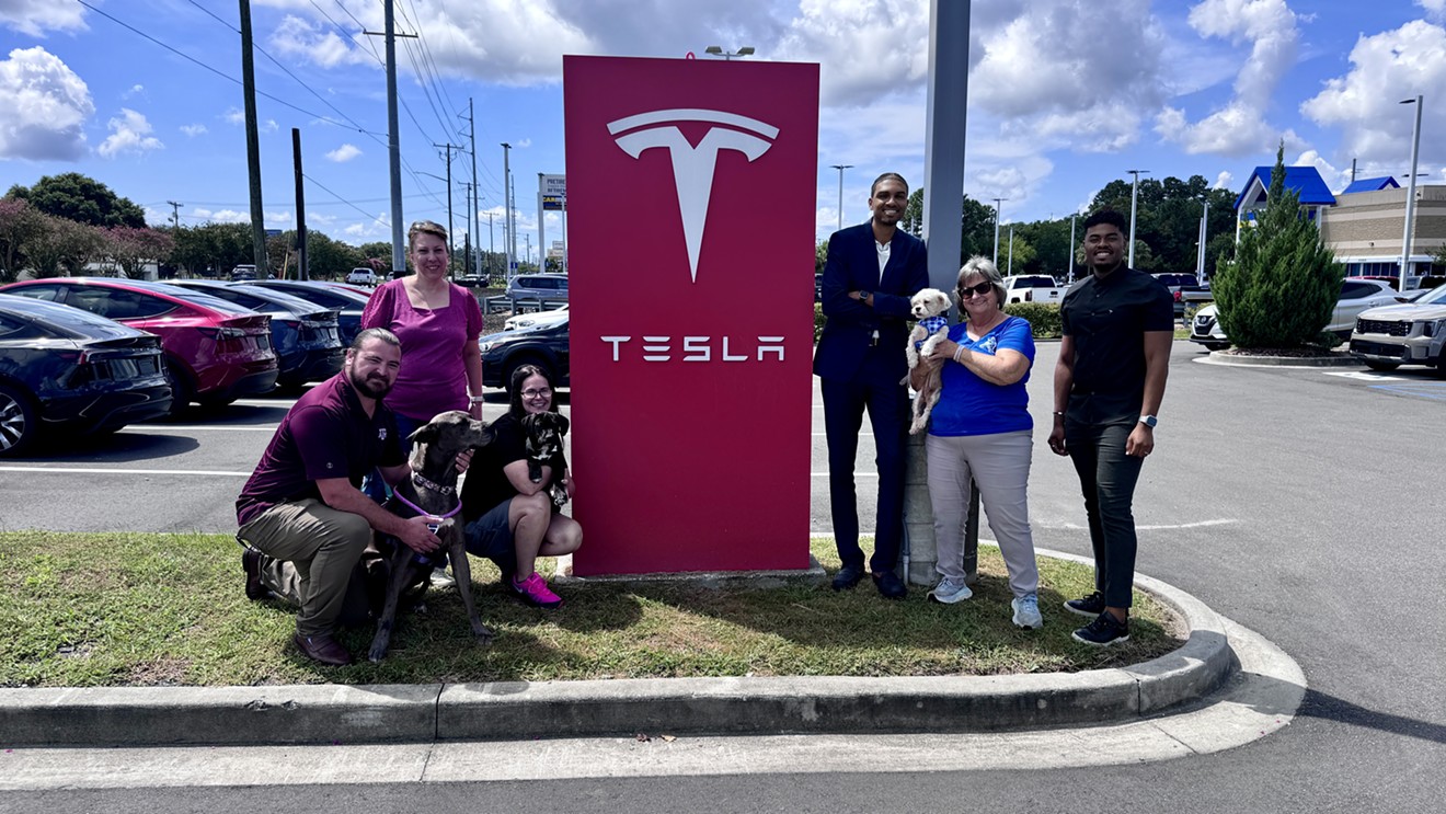 Tesla Hosts Renegade Paws Dog Adoption Event