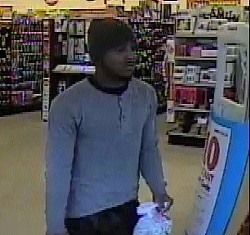 This man is being sought in two Family Dollar armed robberies