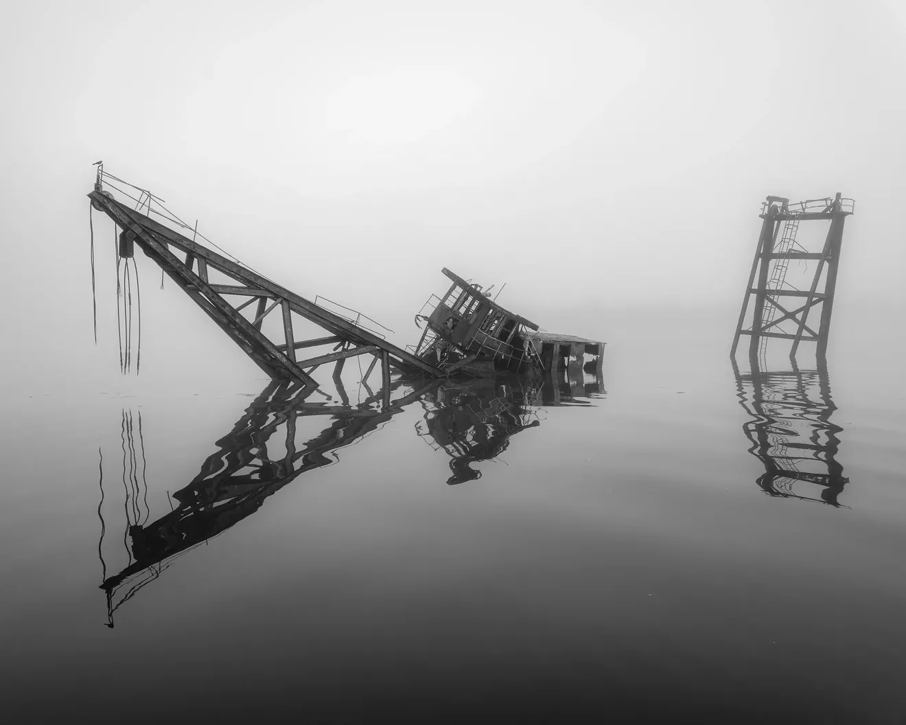 Parker Stewart; Sunken Dredge, Savannah River, 2024; archival pigment print; courtesy of the artist.
