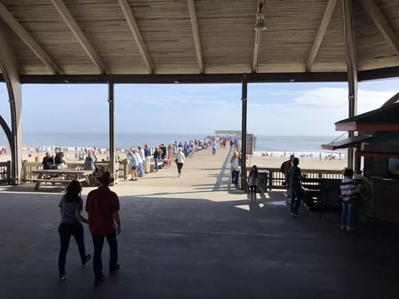 Hundreds take unofficial New Year&rsquo;s Day plunge by Tybee Island pier