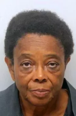Woman charged with murder after death of shooting victim