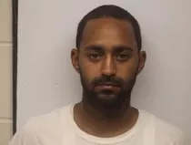 Shootout in Whitaker Street garage injures four; one suspect in custody