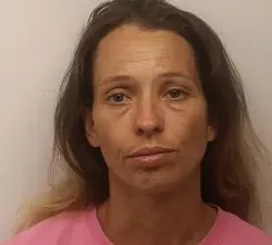 Mom who allegedly tied child to crab trap found hiding in store men's room
